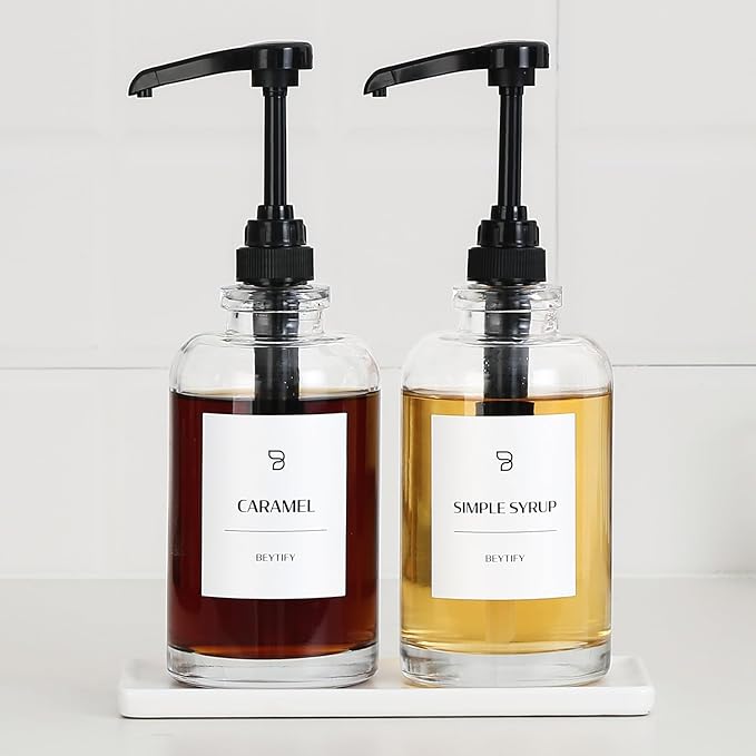 BEYTIFY Coffee Syrup Dispenser Set | Glass Syrup Bottles with Pump Tops & 12 Labels | Refillable Leak-Proof Dispensers for Coffee Bar, Vanilla Caramel Hazelnut Syrups | Clear Glass, 2 Pack (16.9oz/500ml)