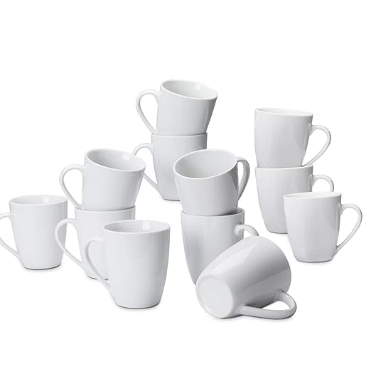 Amazon Basics Porcelain Heat Resistant Coffee Mugs, Microwave and Oven Safe, 12 oz, White, 12 Count by AmazonBasics