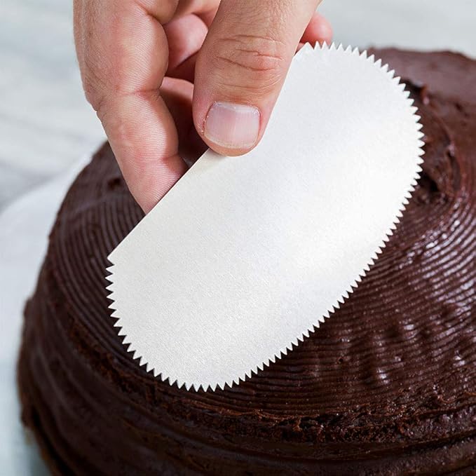 Restaurantware Pastry Tek 4.8 Inch x 2.5 Inch Cake Scraper 1 2-Pattern Cake Smoother - Fine Tooth Edges Straight Edges Metal Icing Smoother Hanging Hole For Decorating Or Sculpting Desserts