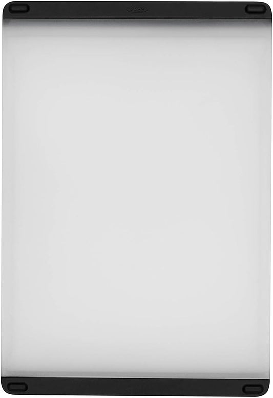 OXO Good Grips Plastic Prep Cutting Board | Compact size, double-sided surface, smooth edges for grabbing, drip catcher, non-slip feet by Unknown
