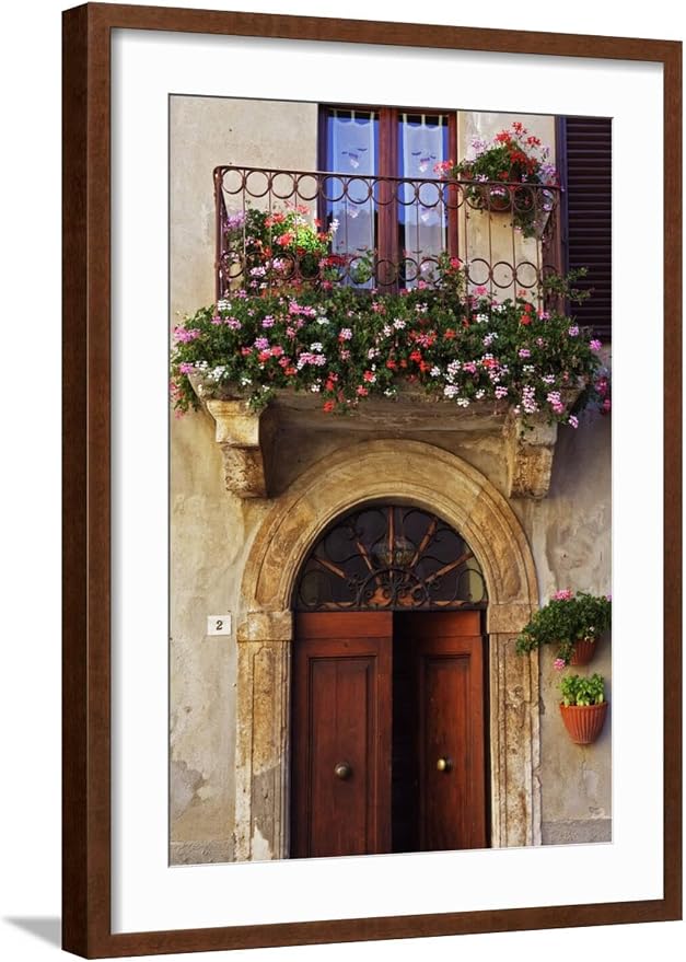 ART.COM Wall Photo Balcony Flowers and Doorway in Pienza Tuscany Italy on Brown Frame by Julian Castle, 21" x 29" by ART