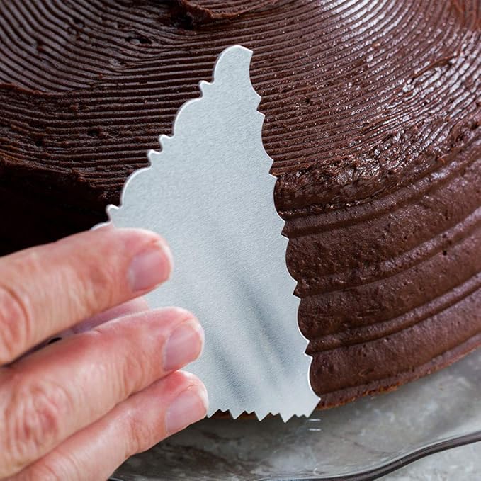 Restaurantware Pastry Tek 4.8 Inch x 3.8 Inch Cake Scraper 1 3-Pattern Cake Smoother - Pleated Edges Hanging Hole Metal Icing Smoother For Decorating Or Sculpting Desserts