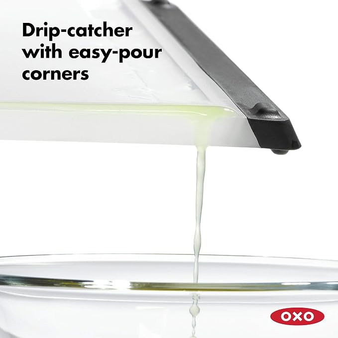 OXO Good Grips Plastic Prep Cutting Board | Compact size, double-sided surface, smooth edges for grabbing, drip catcher, non-slip feet - Image 4