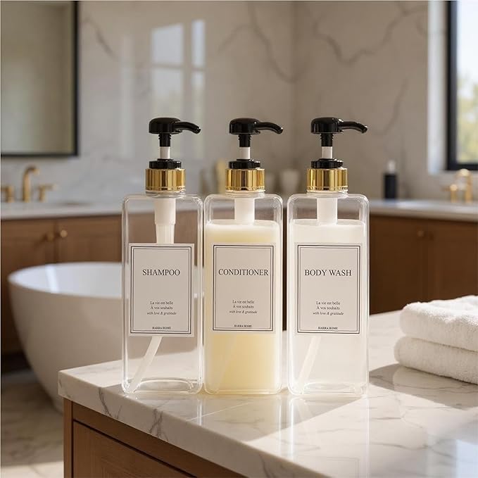 Modern Gold Design Large 27 oz Shampoo and Conditioner Dispensers - Empty Plastic Refillable Pump Bottle Set for Bathroom Shower Soap Dispenser, Includes 6 Waterproof Labels, et of 3 (Clear & Black)