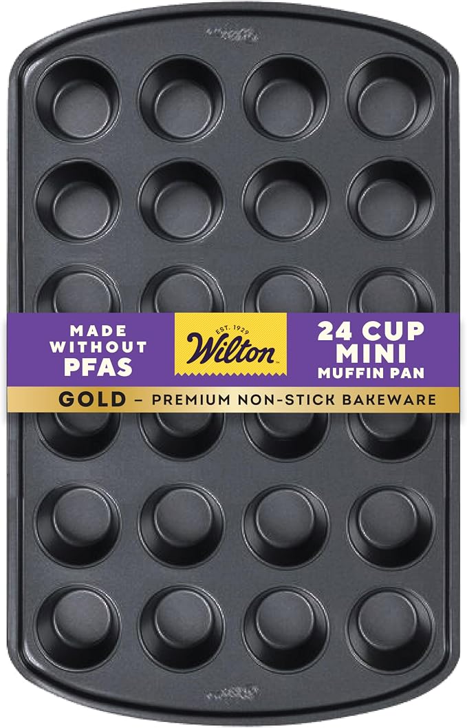 Wilton Gold Non-Stick Muffin Pan, Made Without PFAS, 24-Cup | Non-Stick Steel with Scratch-Resistant Coating, Resists Warping, Extended Handles, Dishwasher Safe, Perfect for Cupcakes by Wilton