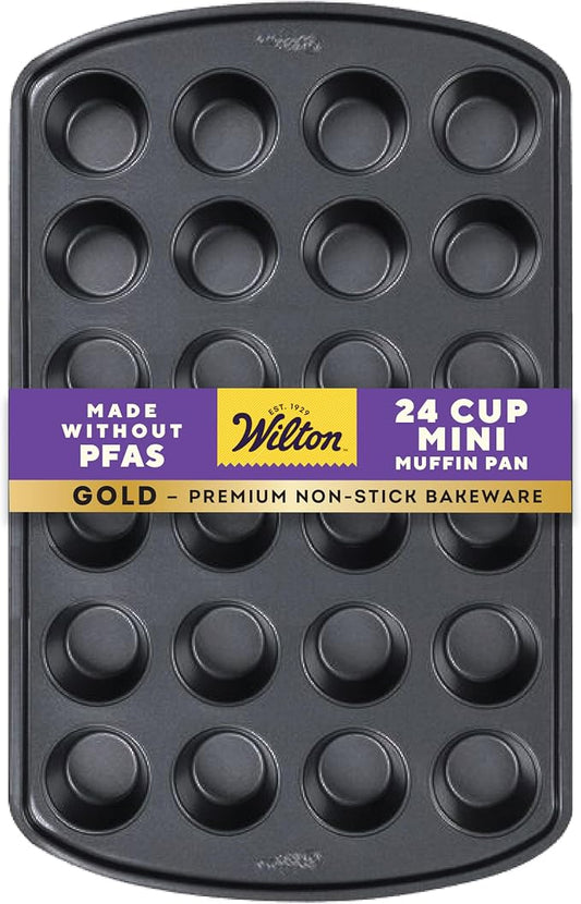 Wilton Gold Non-Stick Muffin Pan, Made Without PFAS, 24-Cup | Non-Stick Steel with Scratch-Resistant Coating, Resists Warping, Extended Handles, Dishwasher Safe, Perfect for Cupcakes by Wilton